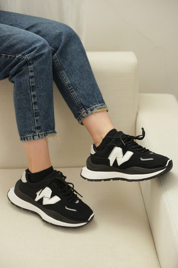کتونی اسپرت زنانه نیو بالانس | مدل New Balance M5560 رنگ مشکی سفید